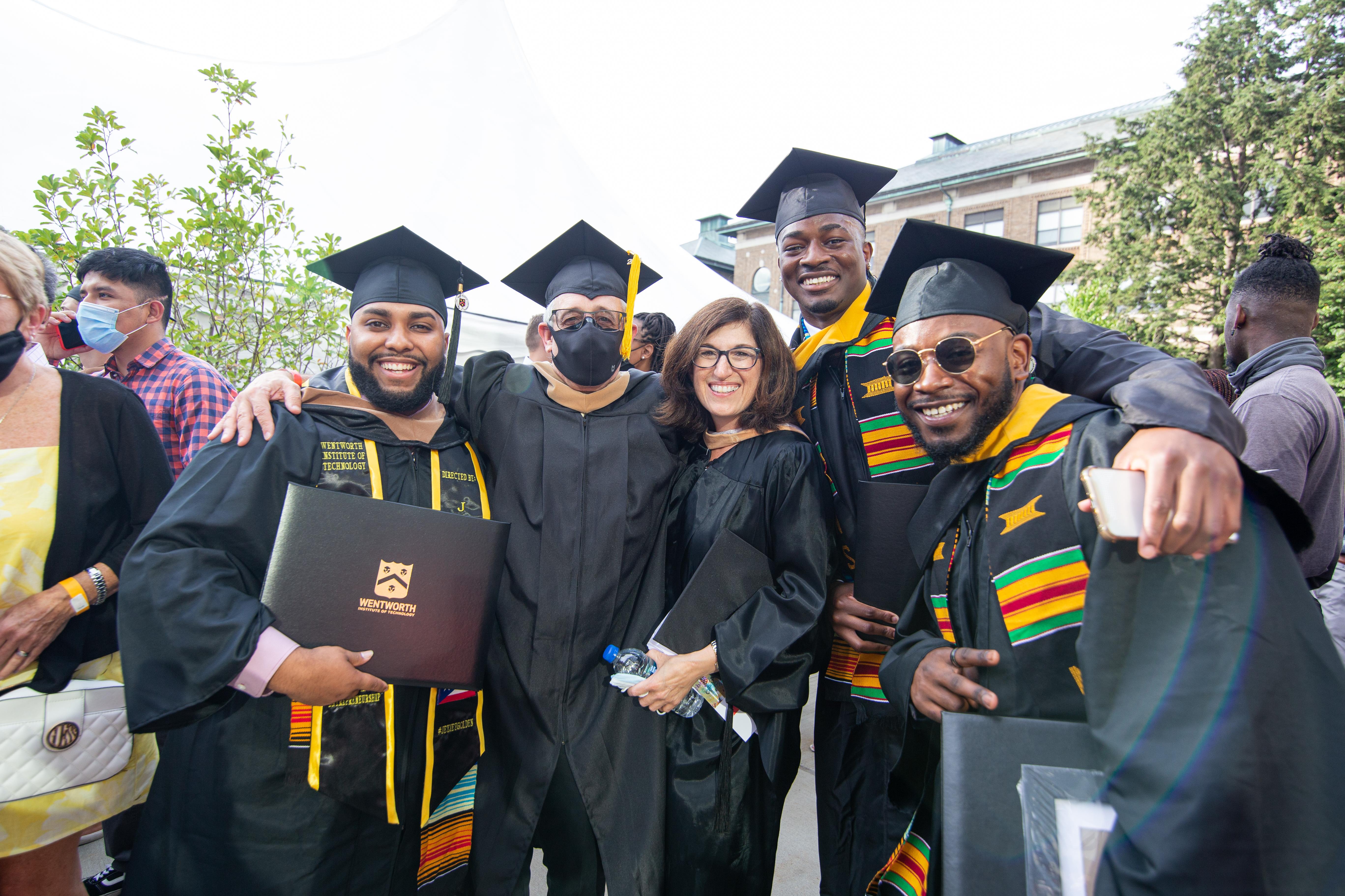 group of people wearing graduation robes