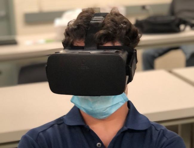 student wearing a virtual reality headset