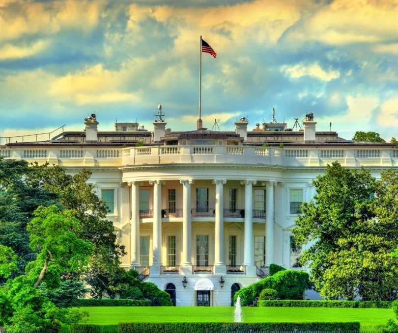 image of the white house at sunset