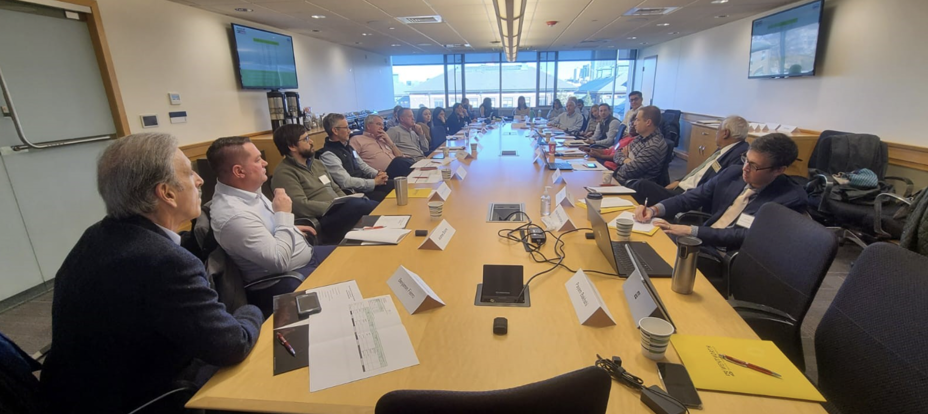 group of people at a long table