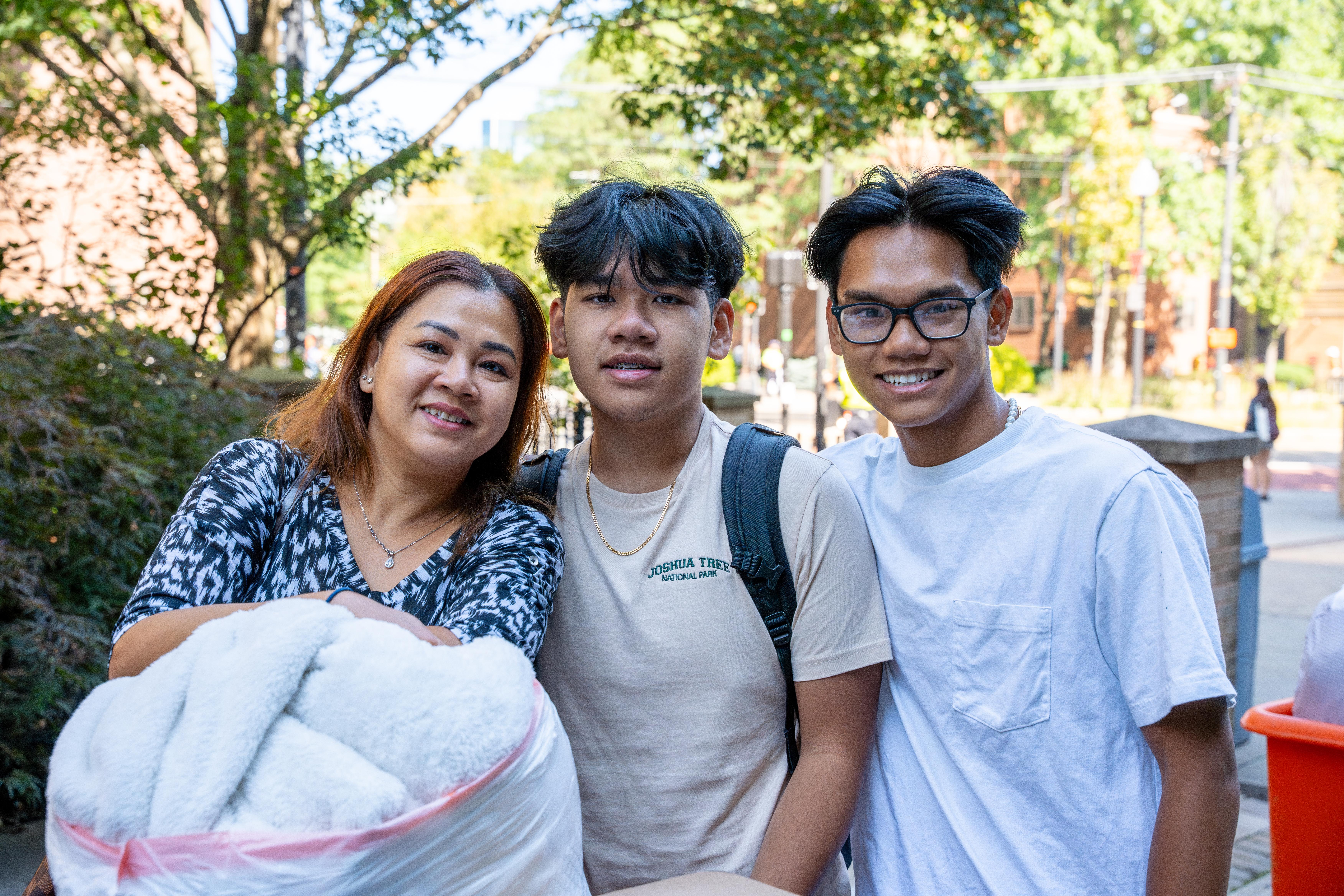 three people looking at the camera