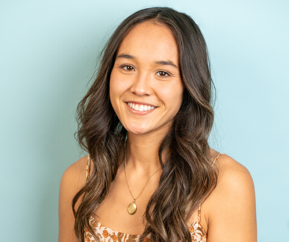 portrait of a woman with a light blue background