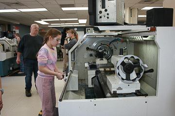 girl using a machine in university lab