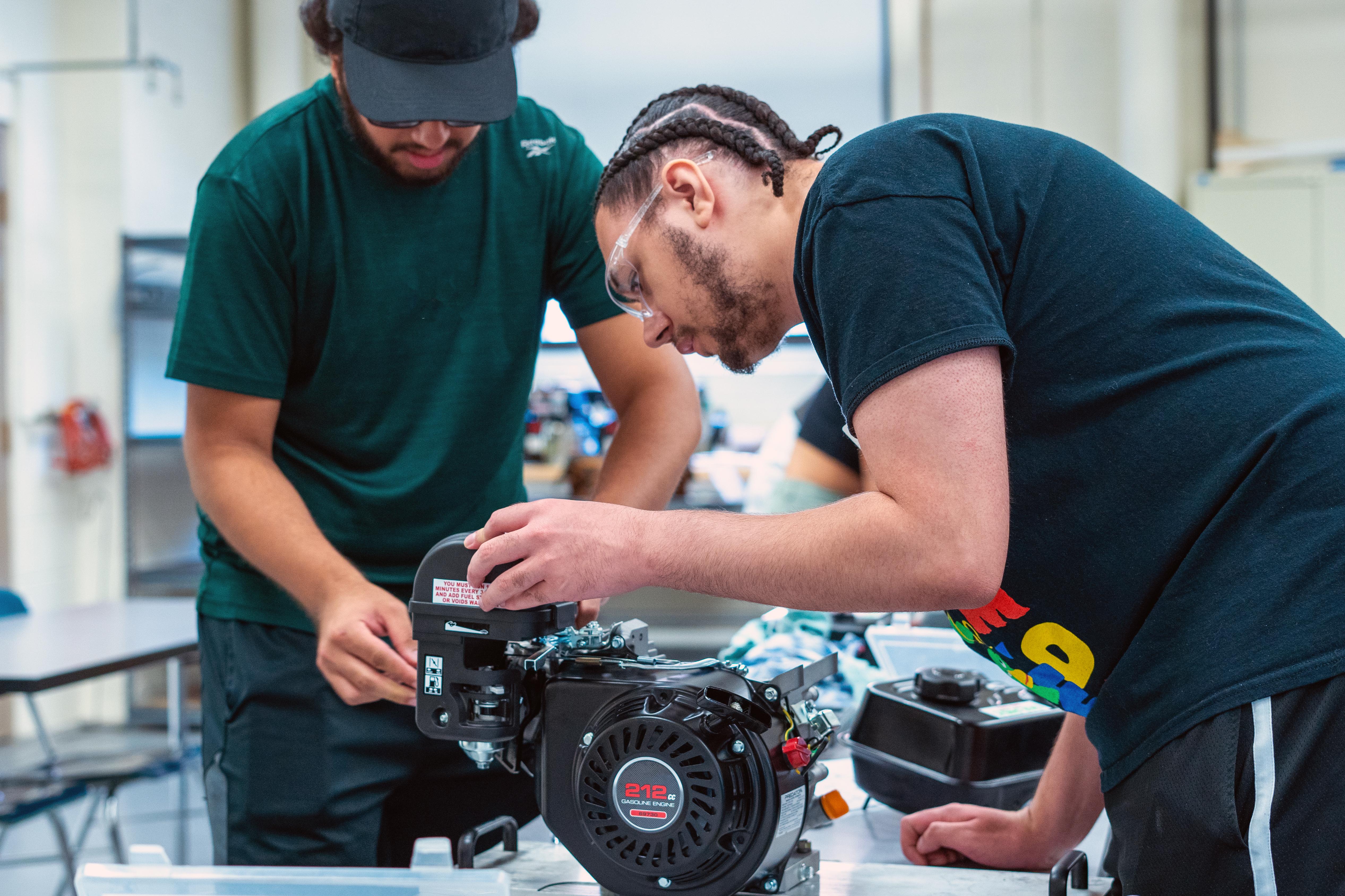 students working on a mechanical project