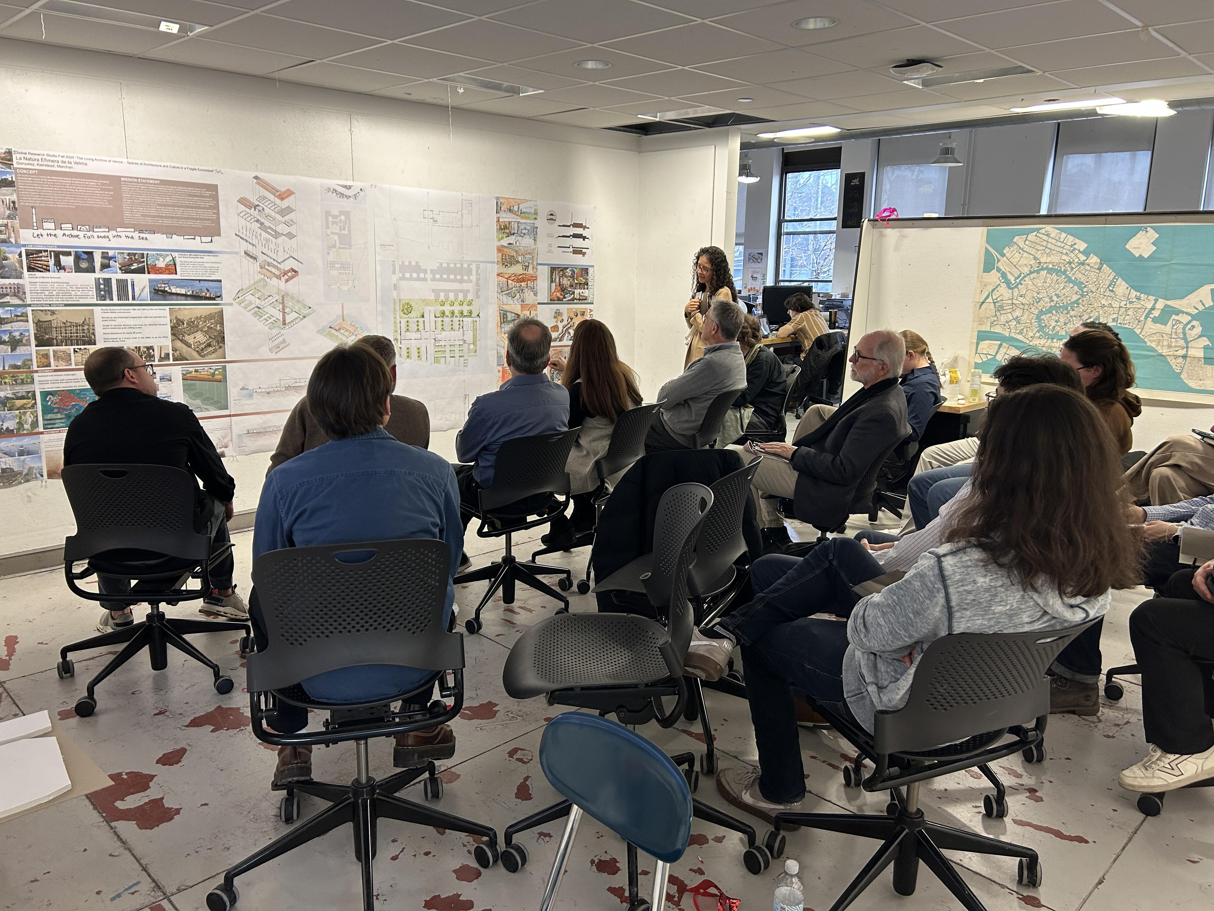 Student presenting work to an audience