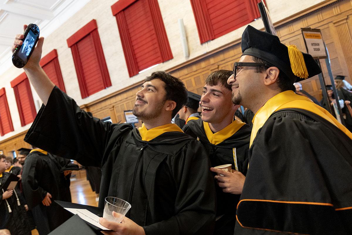 students in graduation regalia