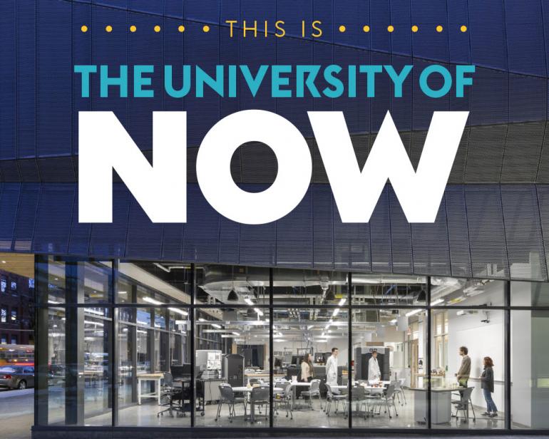 The exterior of the CEIS building at night with the text "This is The University of Now"