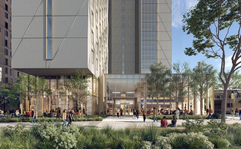 First Year Tower Rendering from the Front - students walk by a tall modern looking dorm with glass windows and trees in the courtyard
