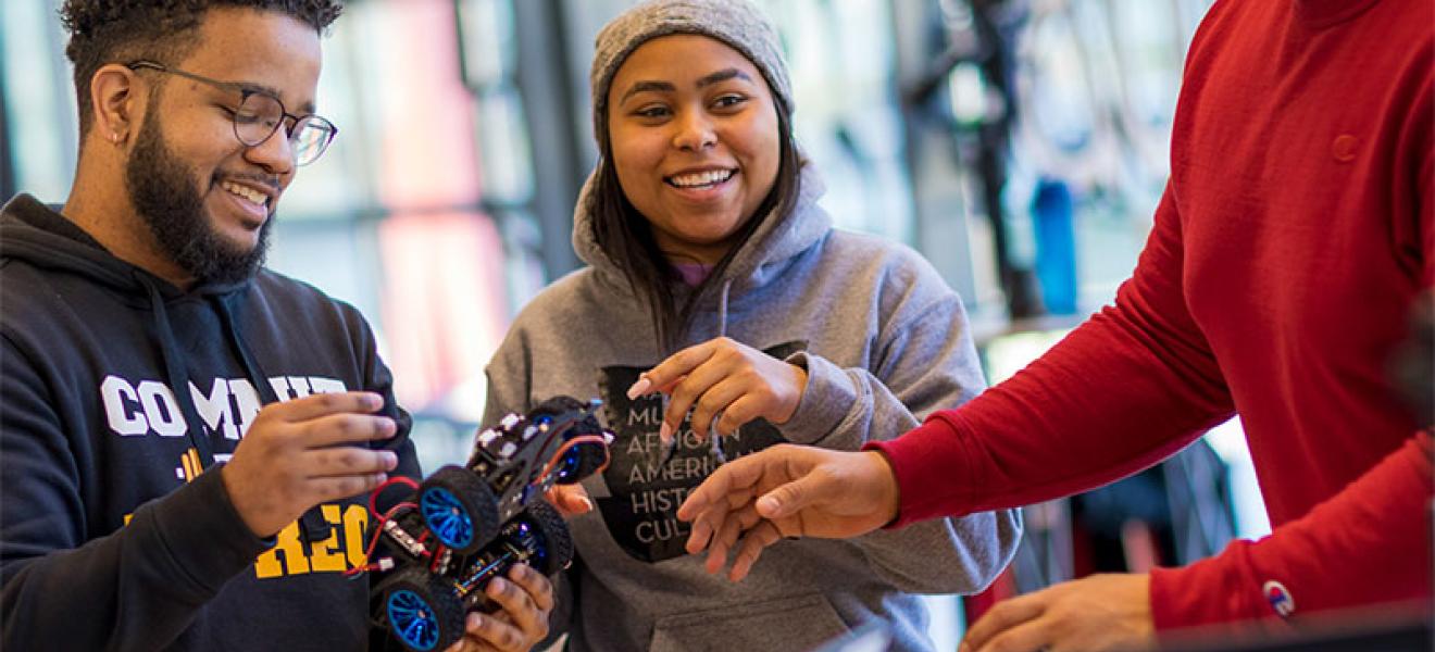 Students collaborate on a robotics project.