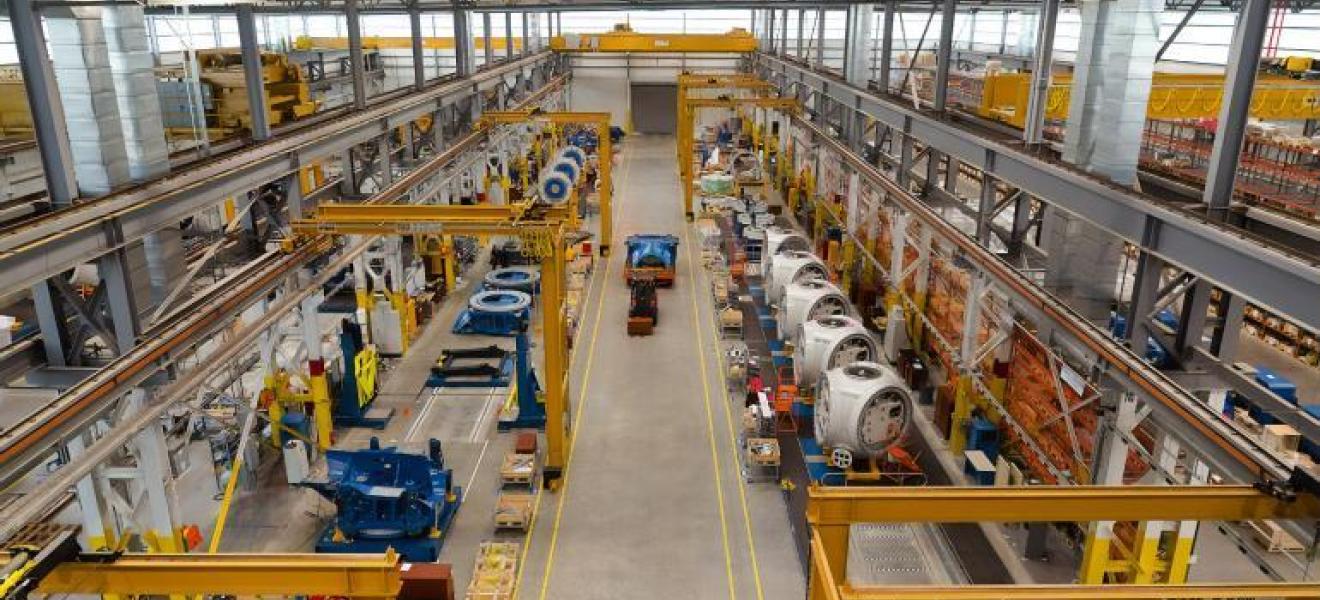 A large warehouse facility with big machinery inside