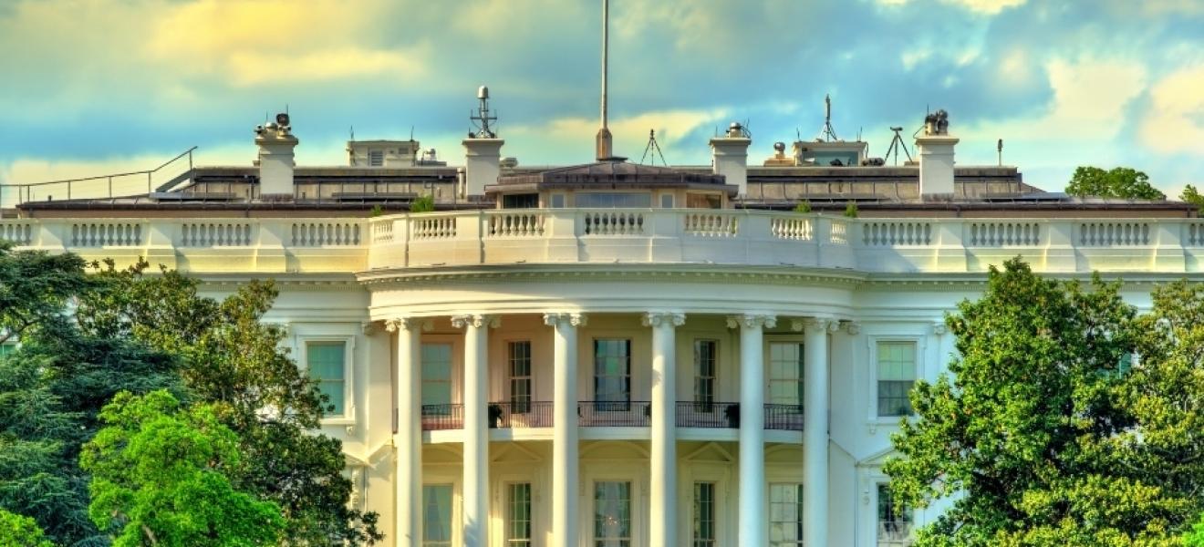 image of the white house at sunset