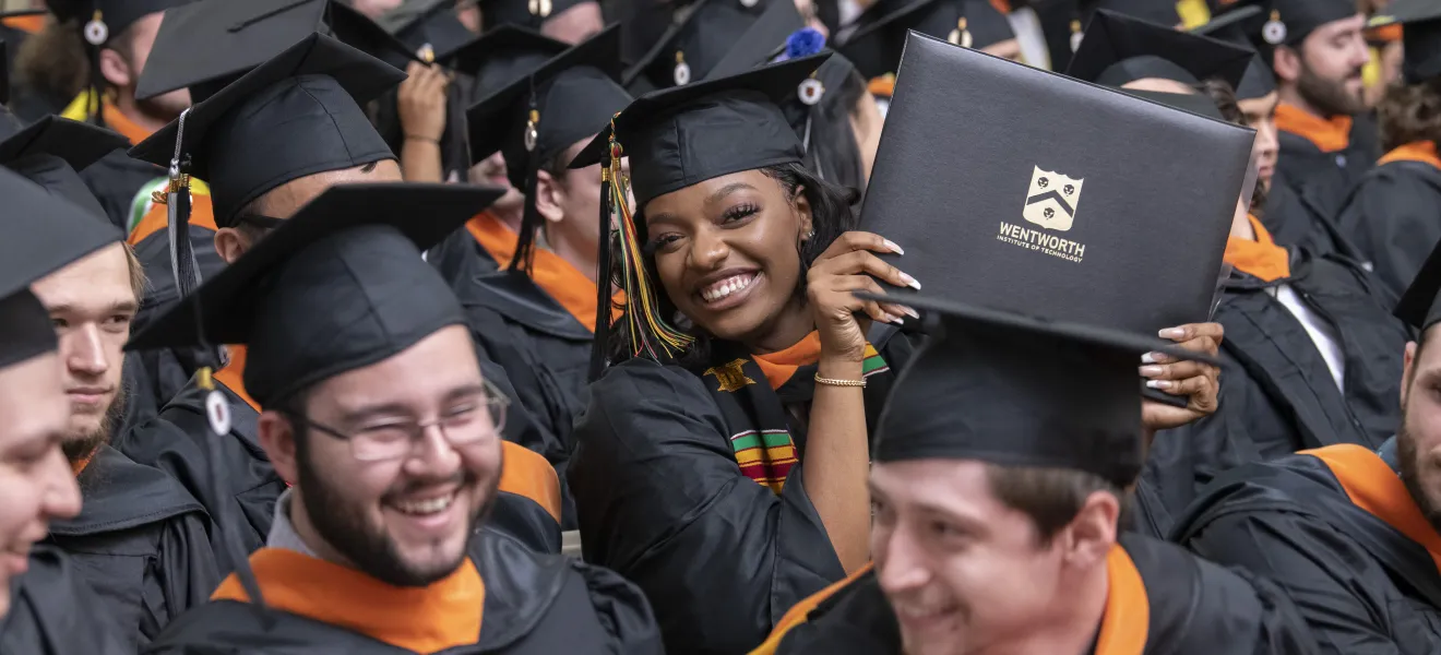 students wearing graduation caps and gowns