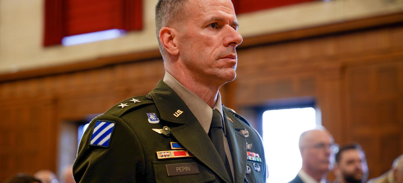 a man in military uniform looks ahead