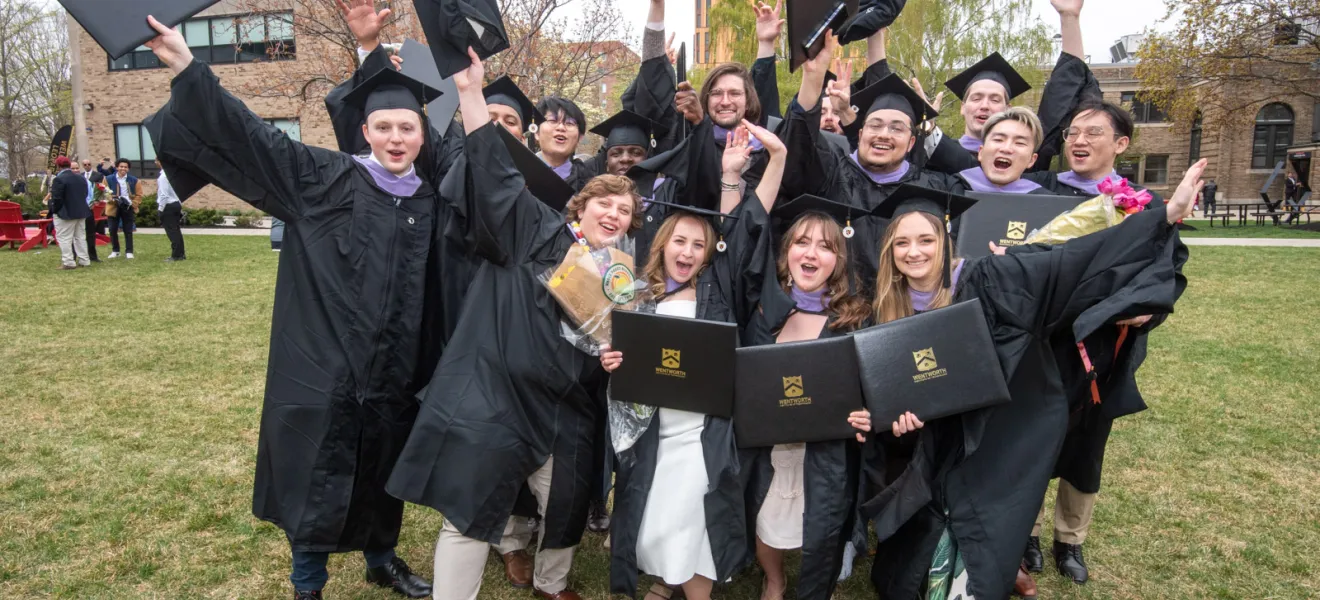 group of students wearing graduation robes