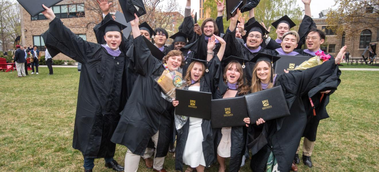 group of students wearing graduation robes