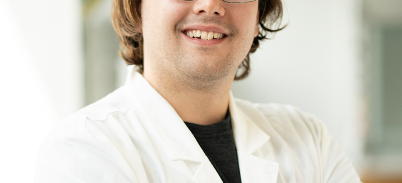 portrait of a man wearing a lab coat