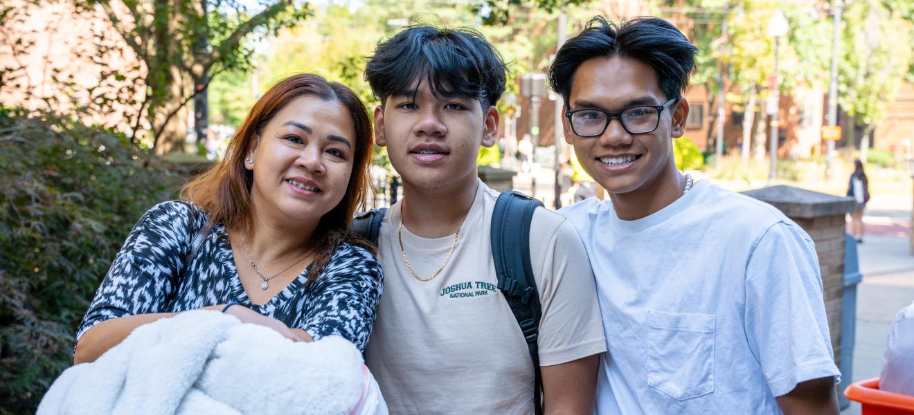 three people looking at the camera