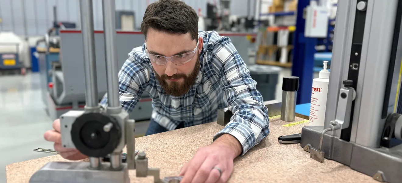man working on sound equipment