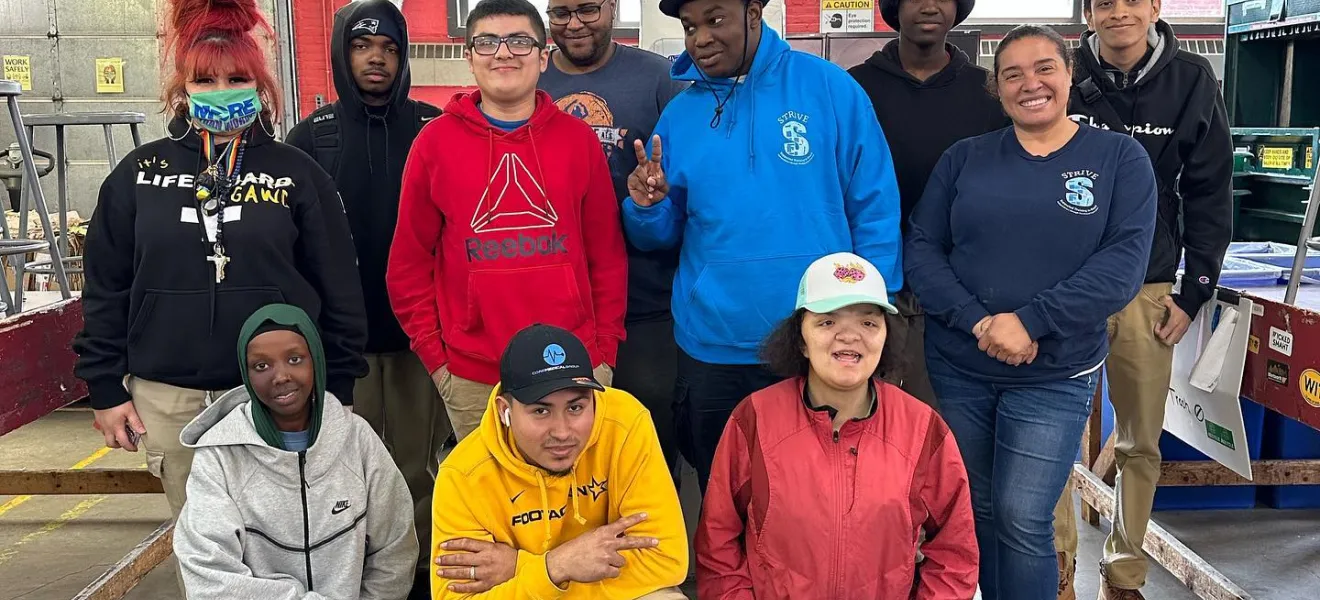 group of people posing for the camera