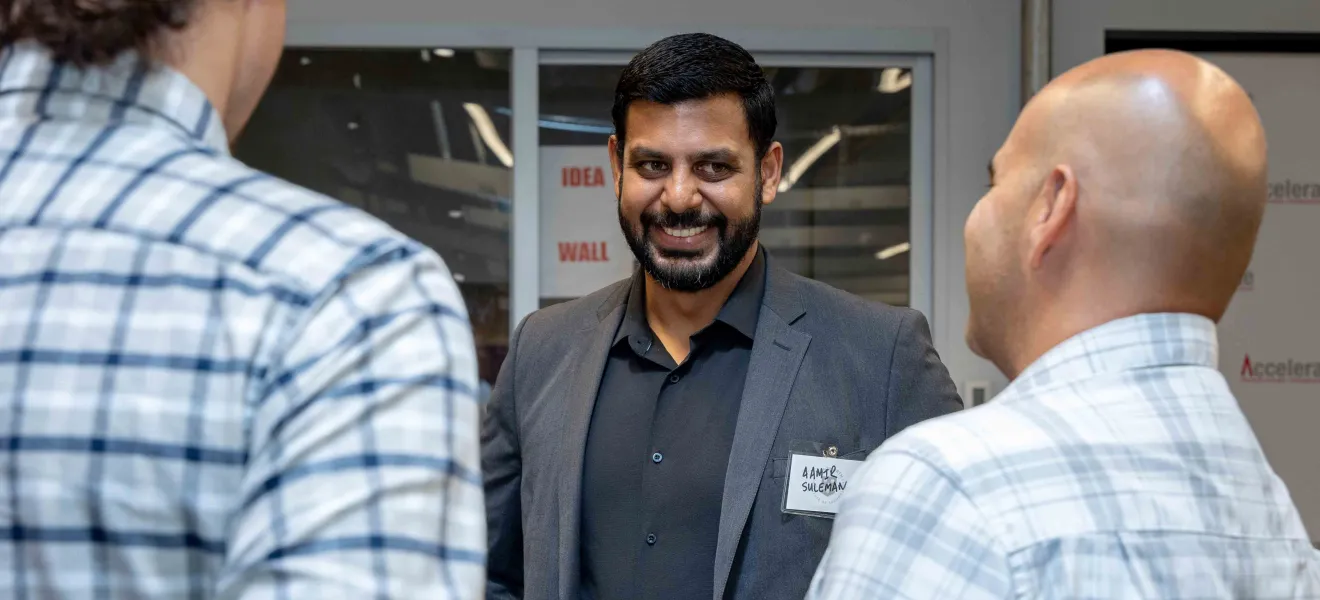 smiling man in suit