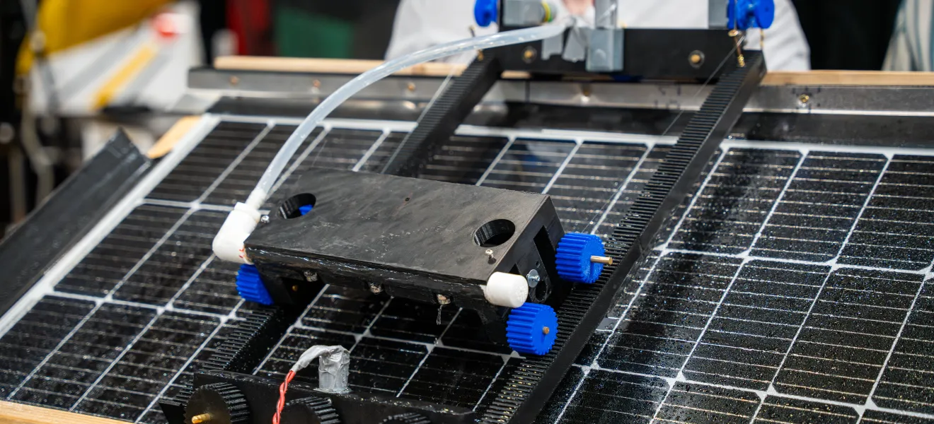 up close picture of a robotic item on top of a solar panel