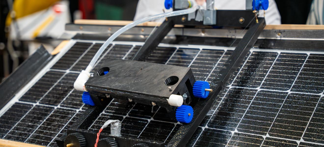 up close picture of a robotic item on top of a solar panel