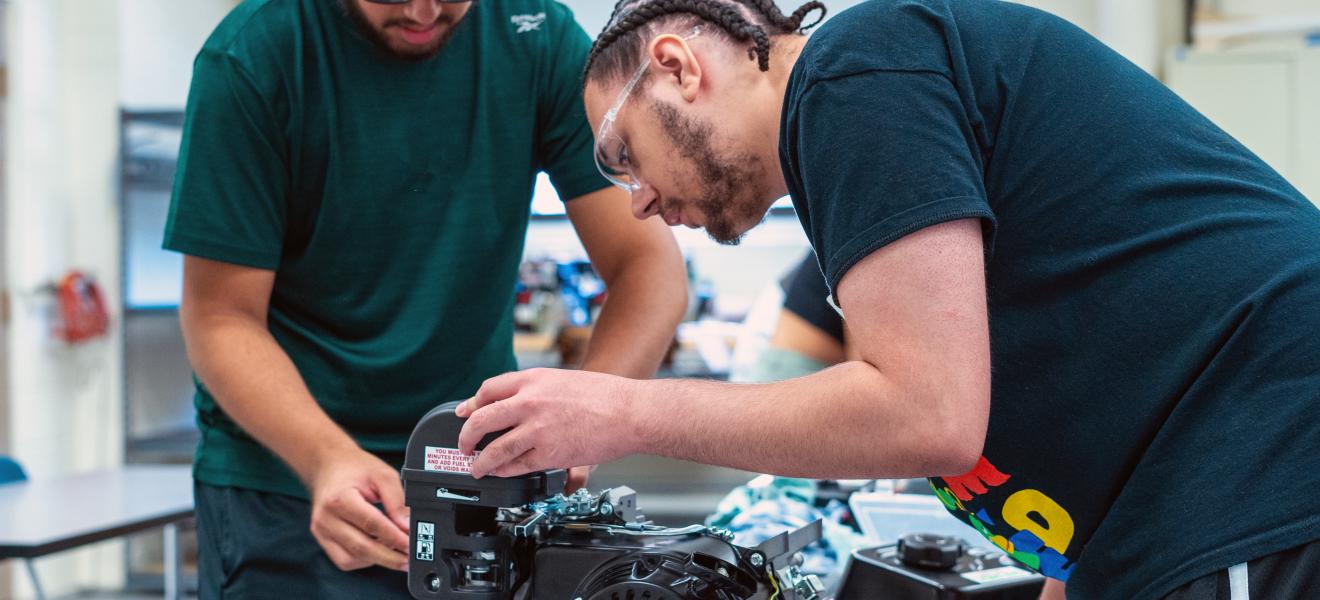 students working on a mechanical project