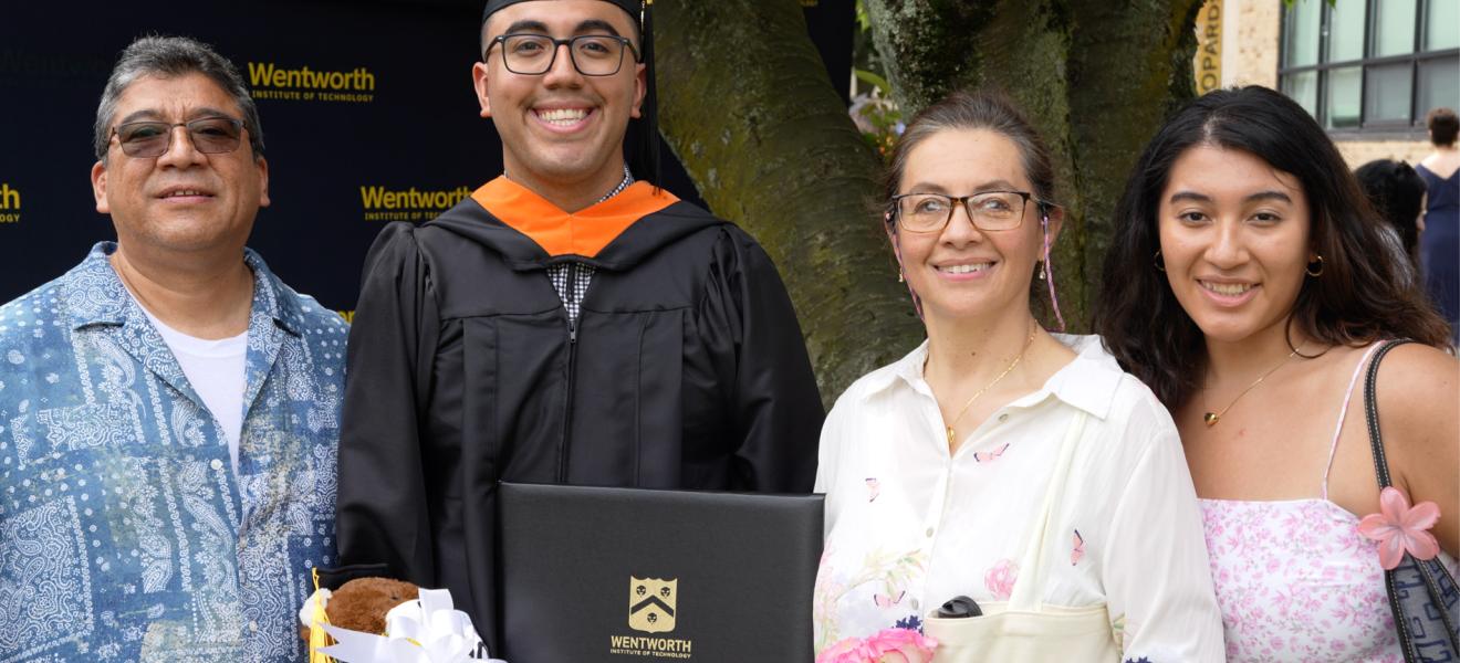 a smiling family at the Wentworth graduation ceremony