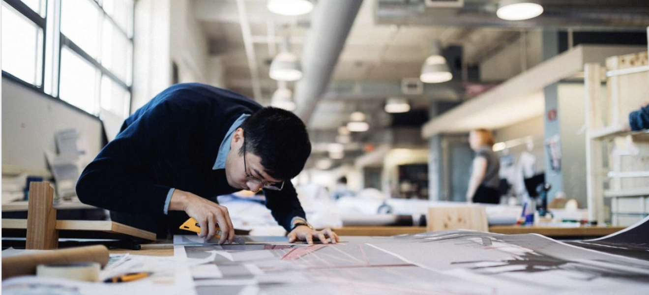 a student works in an architecture studio