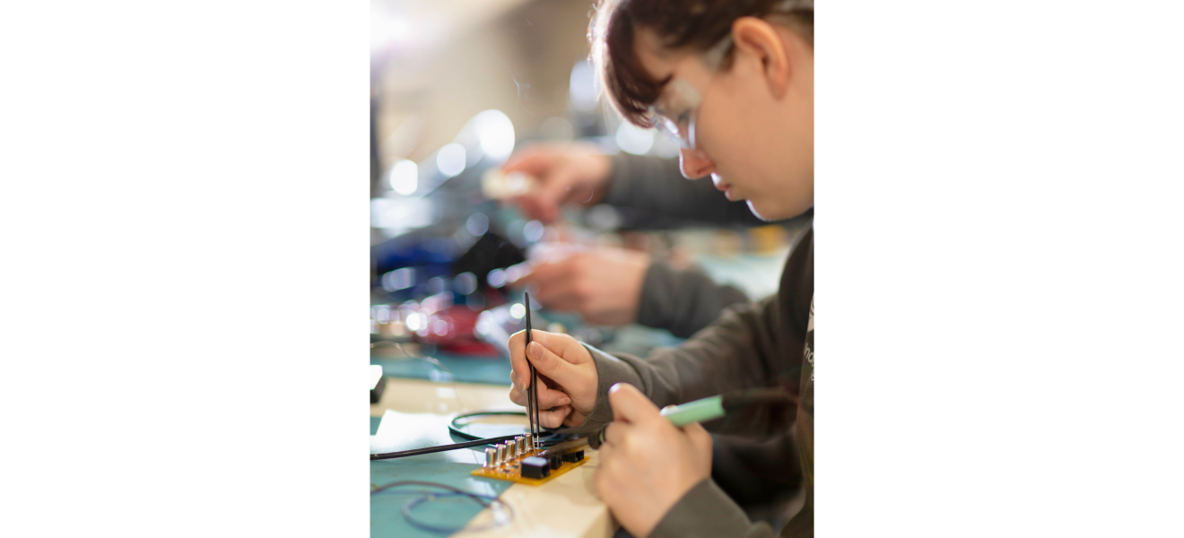 a woman working on a computer engineering project