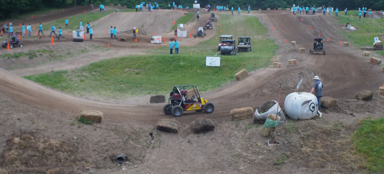 a dirt track featuring a buggy racing vehicle