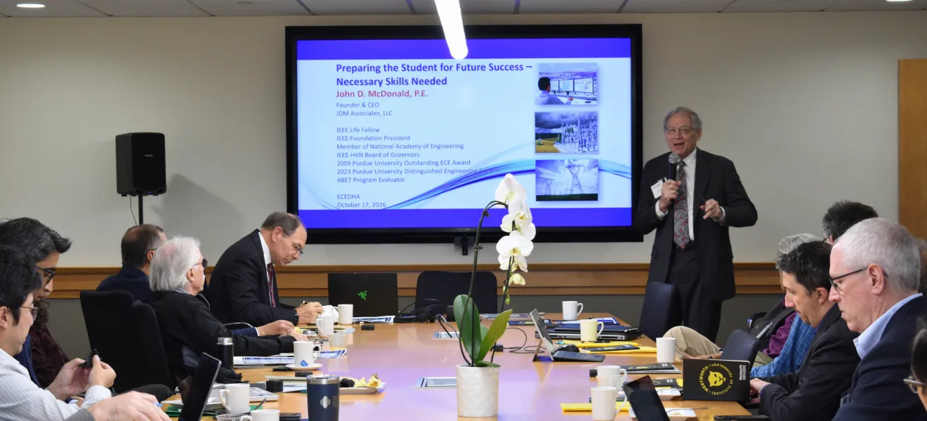 a group of people in a conference room