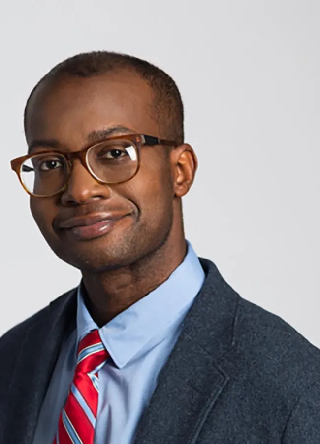 Assistant Professor David Simpson Smiling