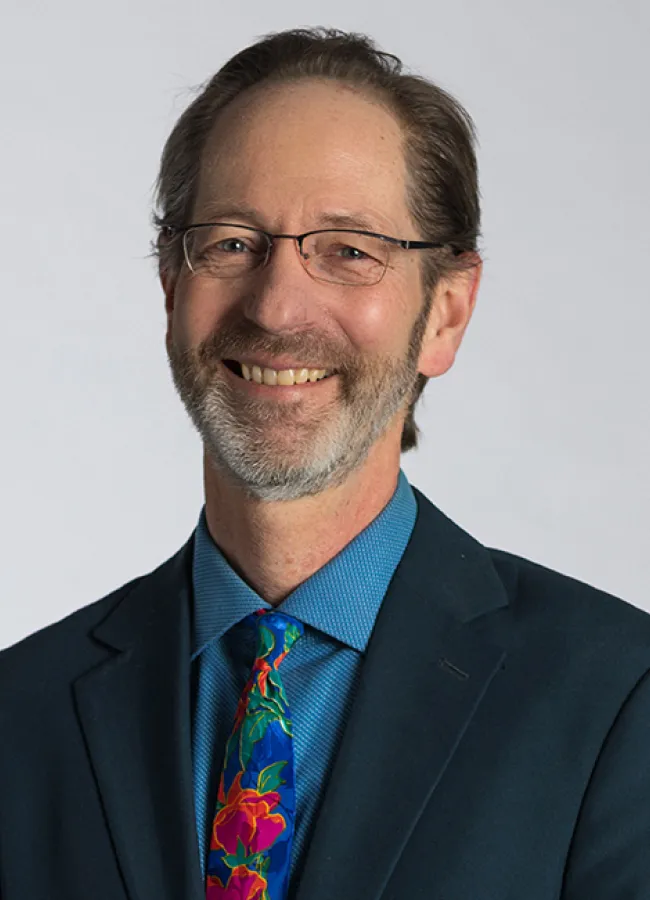 A headshot of a man