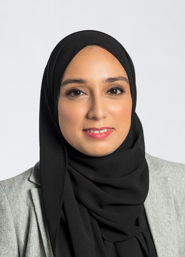 A headshot of a woman