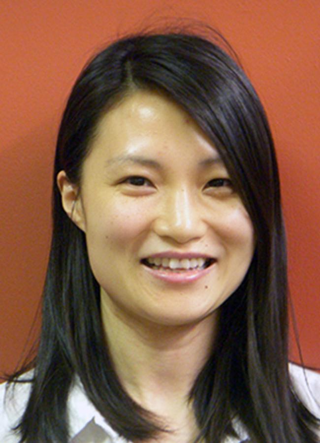 A headshot of a woman