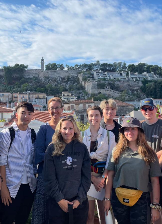 Meliti Dikeos and a group of Architecture students pose together in Greece during the Global Research Studio study abroad