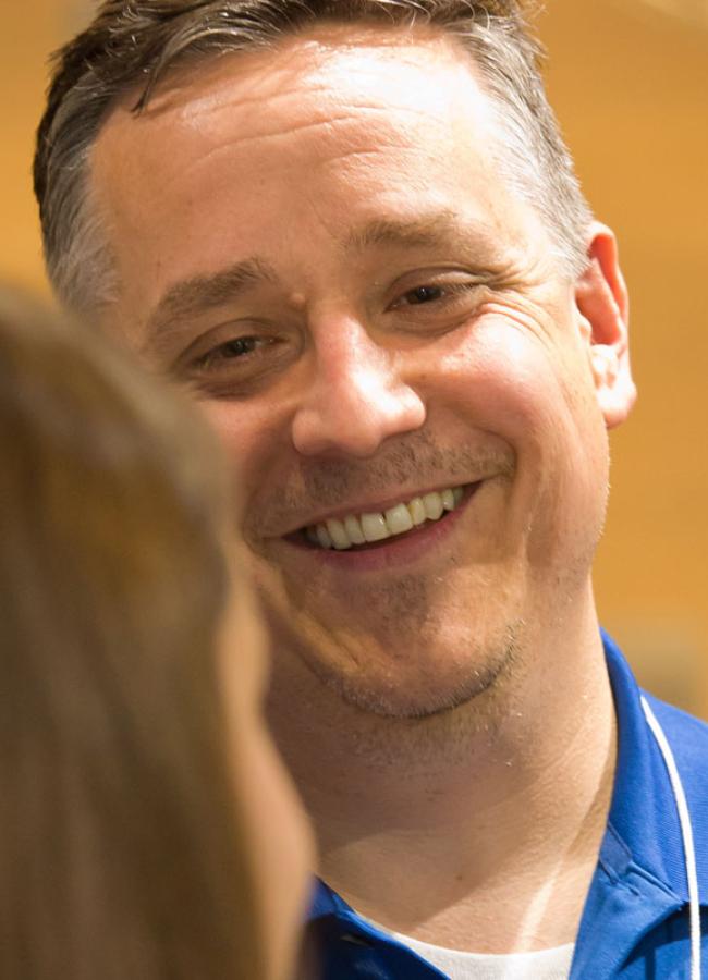 Mark Mixer speaking with alumni at the Applied Math reunion