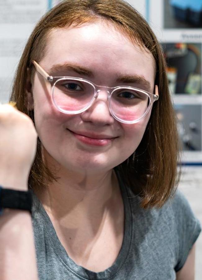 Sky Wildhund with her wrist wearable for sensing VR