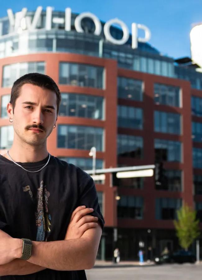 Jasper Chappelle stands outside the WHOOP office in the Fenway area of Boston